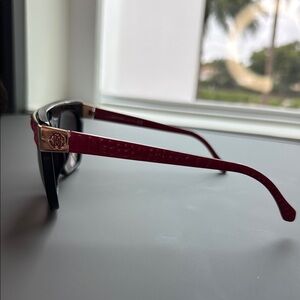 Stylish Red Sunglasses with Gold Accents
